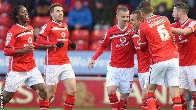 Walsall celebrate with Kieron Morris