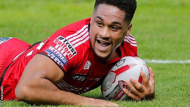 Salford's Derrell Olpherts scores a try