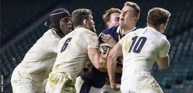 Van der Merwe holds off multiple tacklers to score against England