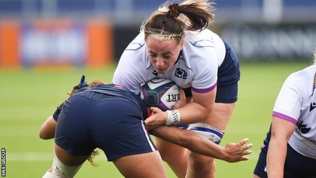 Scotland's Evie Gallagher is tackled by USA's Olivia Ortiz during a Summer Test match between Scotland Women v USA at the DAM Health Stadium