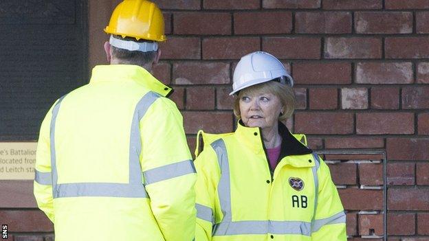 Hearts owner Ann Budge (right) speaks to a safety inspector at Tynecastle