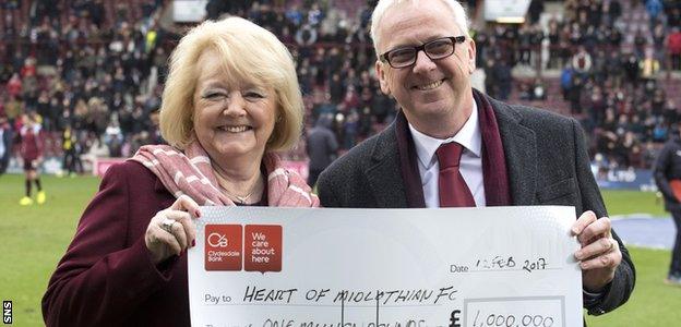 Hearts owner Anne Budge receives a donation of £1m from Foundation of Hearts chairman Stuart Wallace