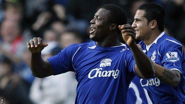 Yakubu celebrates with Everton team-mate Tim Cahill after scoring against his former club Middlesbrough at Goodison Park in November 2008