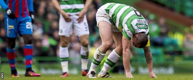 Celtic's Scott Brown goes down injured