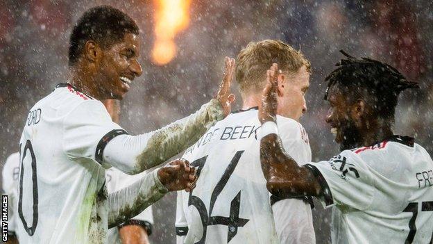 Marcus Rashford celebrates United's second goal