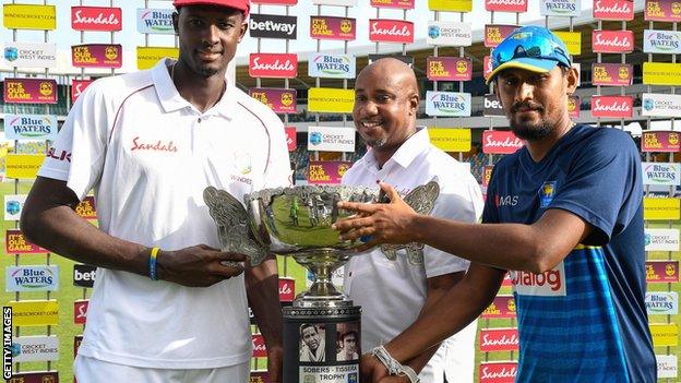 West Indies captain Jason Holder and Sri Lanka stand-in skipper Suranga Lakmal with the Sobers-Tissera Trophy