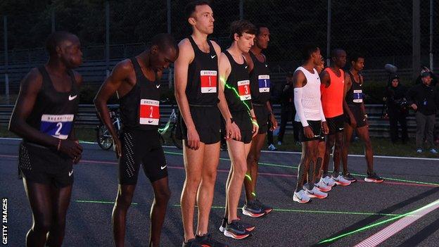 Desisa, Kipchoge and Tadese (all far right) were joined by five pacemakers when the event began