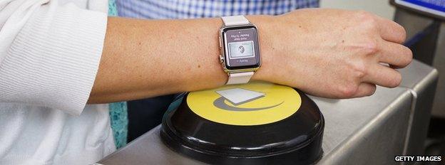 apple watch being used on London tube