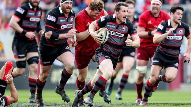 Mark Bennett makes a break for Edinburgh against Munster