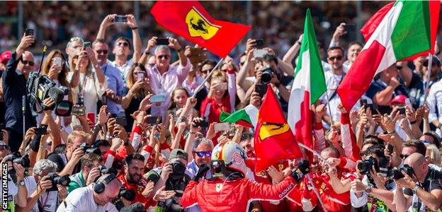 Sebastian Vettel celebrates winning the British Grand Prix at Silverstone