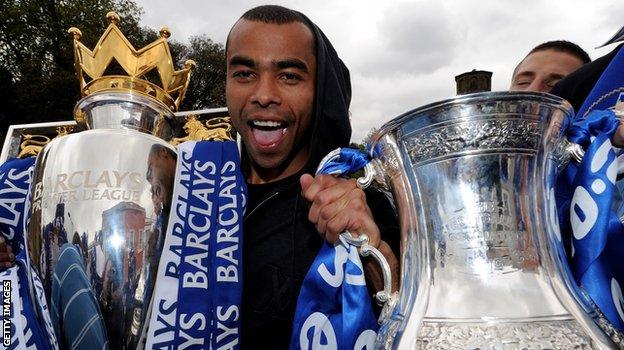 Ashley Cole celebrates winning the Double with Chelsea in 2010. With Arsenal and across London with the Blues, he won three Premier League titles, seven FA Cups and one League Cup - plus the 2012 Champions League and the 2013 Europa League