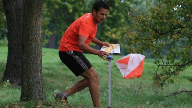 Young man taking part in Orienteering