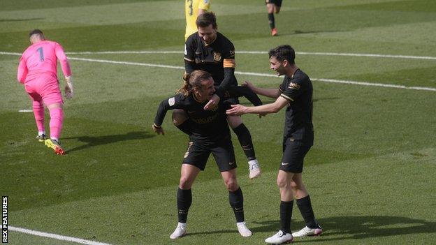 Antoine Griezmann celebrates after scoring for Barcelona against Villarreal