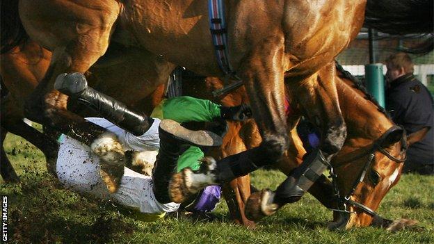 Ruby Walsh falls off Kauro Star during the 2006 Cheltenham Festival