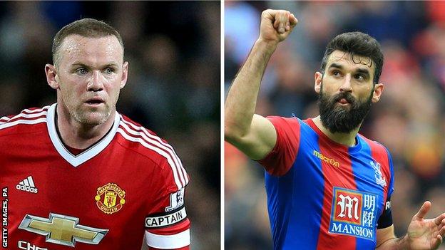 Wayne Rooney and Mile Jedinak