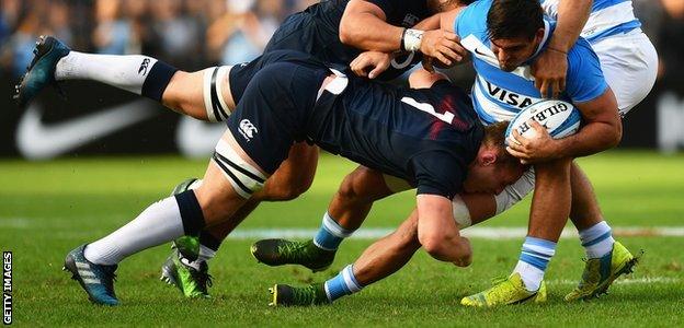 Sam Underhill tackles an Argentina player in the summer tour