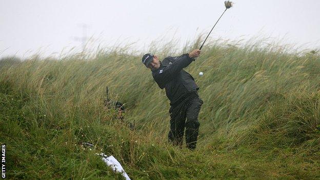 Padraig Harrington plays a shot during the first round of the 2008 Open Championship