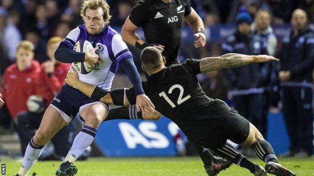 Stuart Hogg takes on All Blacks centre Sonny Bill Williams