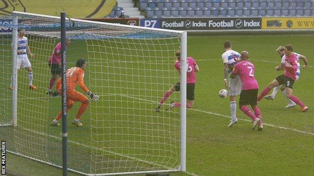 Charlie Austin of QPR has a shot well saved by Derby County Goalkeeper Kelle Roos