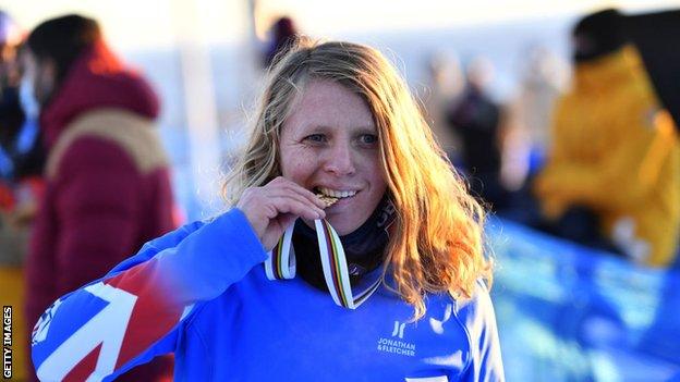 British snowboarder Charlotte Bankes celebrates winning gold at the World Championships in Sweden in February