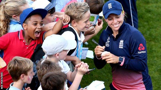 Children watching cricket