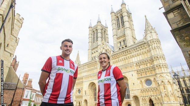 Lincoln City's Regan Poole with Lincoln City Women captain Amy Kay