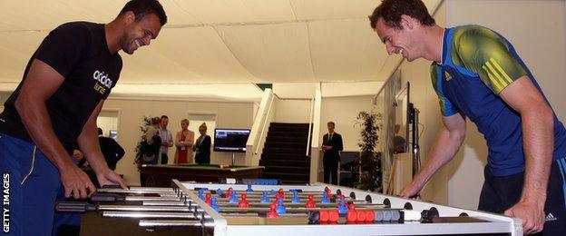 Jo-Wilfried Tsonga and Andy Murray play table football