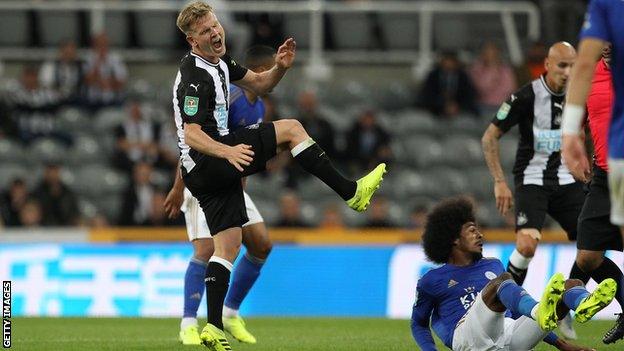 Matt Ritchie (left) suffers his injury against Leicester