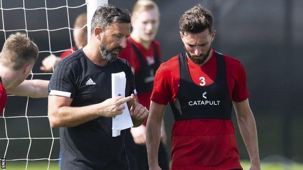 Derek McInnes and Graeme Shinnie in Dubai training