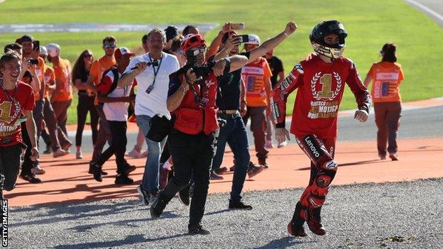 Francesco Bagnaia celebrates winning MotoGP world championship