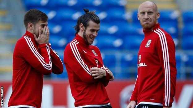 James Collins (right) pictured with Aaron Ramsey and Gareth Bale