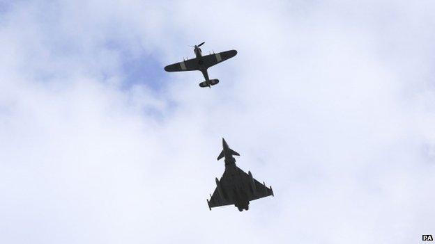 A Hurricane and Typhoon (bottom) fly over Horse Guards Parade, London, during the National Commemoration and Drumhead Service