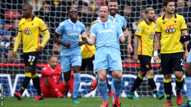 Charlie Adam celebrates after Stoke City take the lead at Watford