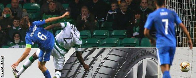 Daniel Berg Hestad of Molde beats Celtic's Tyler Blackett to the ball to score