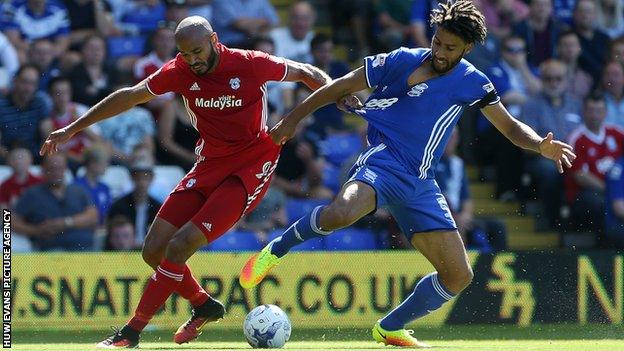 Frederic Gounongbe clashes with Birmingham City's Ryan Shotton