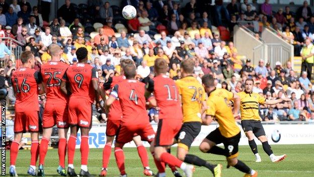 Matthew Dolan of Newport County scores from a free kick