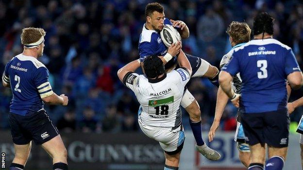 Glasgow's Zander Fagerson tackles Leinster's Zane Kirchner in mid air