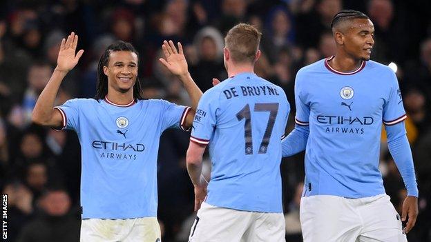 Nathan Ake celebrates his goal for Manchester City