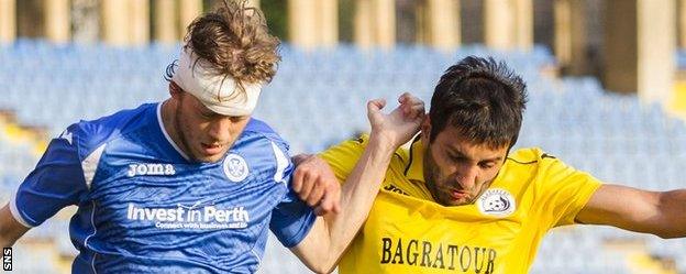 Murray Davidson (left) sports a bandage on his injured head