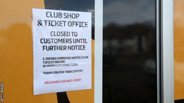 A sign at Cambridge United telling fans the club shop and ticket office is closed