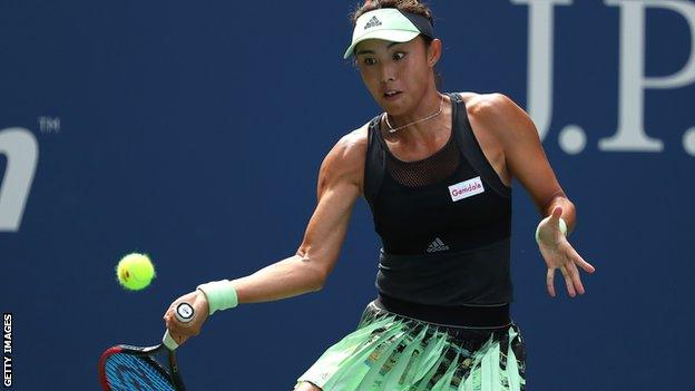 Wang Qiang plays a forehand in her US Open fourth-round match against Ashleigh Barty