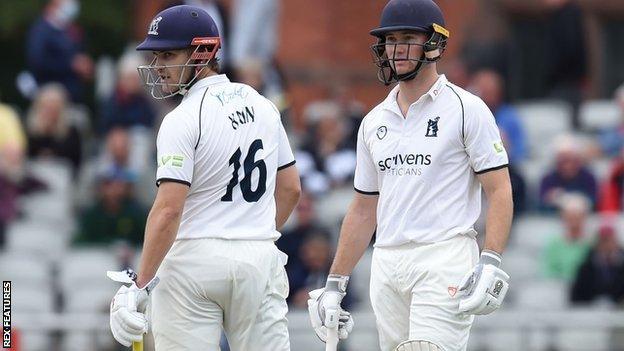 Chris Benjamin and Sam Hain shared a 237-run stand for Warwickshire's second wicket at Old Trafford