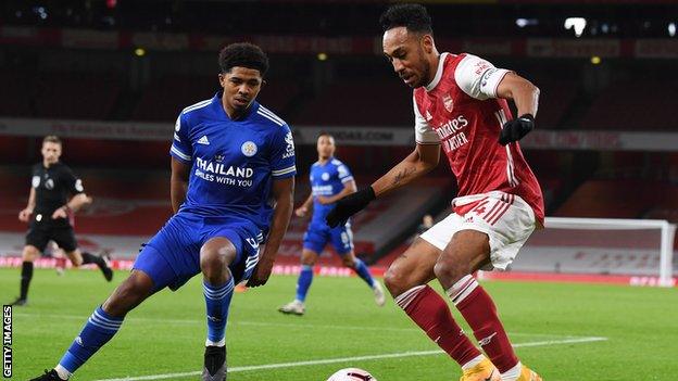 Wesley Fofana of Leicester City marks Pierre-Emerick Aubameyang of Arsenal