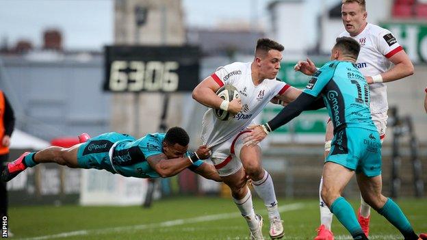 Ulster centre James Hume is tackled