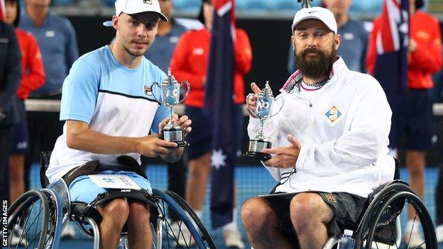 Andy Lapthorne and David Wagner with their Australian Open quad wheelchair doubles final runners-up trophies