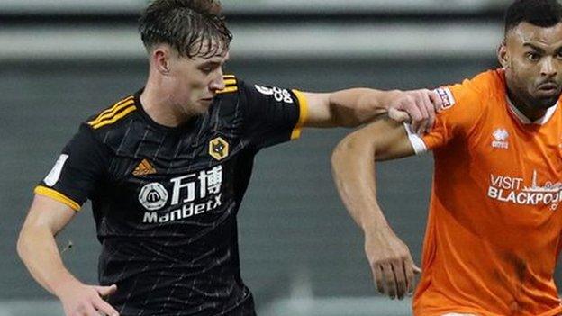 Terry Taylor (left) played four games for Wolves in the EFL Trophy, but made only one senior appearance