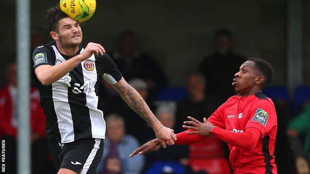 Mickel Miller (right) in action for Carshalton Athletic