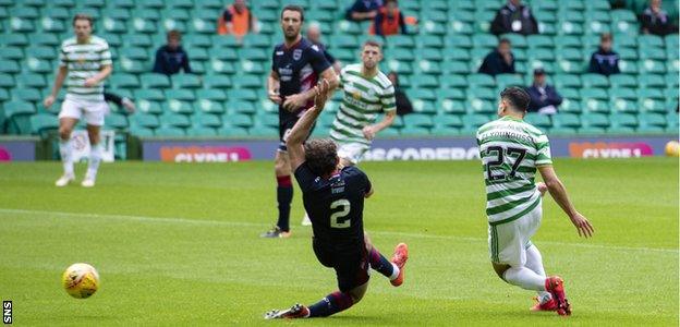 Mohamed Elyounoussi scores for Celtic in a friendly against Ross County