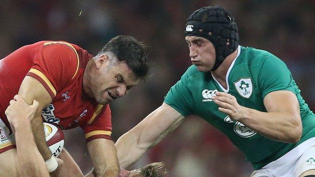 Tommy O'Donnell is about to tackle Mike Phillips in Saturday's game