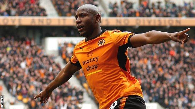 Benik Afobe celebrates a goal for Wolves